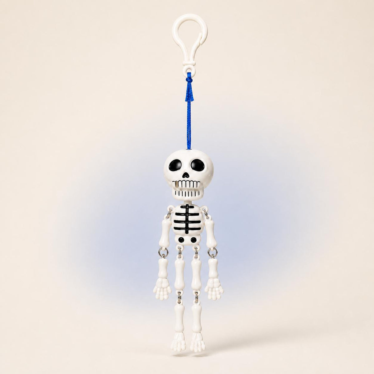 Mr. Bones hanging from its white clip